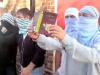 Британские националисты арестованы за сожжение Корана