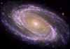 NASA удалось заснять розовое сияние спиральной галактики