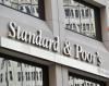 Standard & Poor's опустило рейтинги «Газпрома» и «Роснефти» на «мусорный» уровень