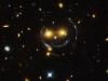 Телескоп Hubble сфотографировал в скоплении галактик «смайлик»