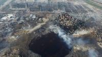 На месте взрыва в Тяньцзине образовалась воронка глубиной 7 метров