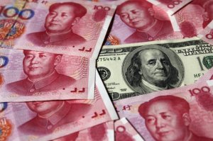 Прогноз: КНР девальвирует юань сразу на 50%