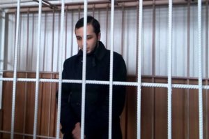 За порванный портрет Порошенко активиста могут посадить на семь лет