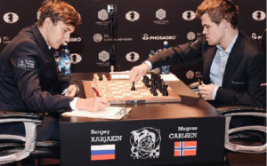 Карякин сыграл вничью с Карлсеном в девятой партии, оставшись лидером в матче за шахматную корону со счётом 5:4. Десятая партия состоится сегодня, в 22:00 мск. Россиянин сыграет чёрными