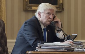 "Со знаком плюс": реакция на первый разговор Путина и Трампа