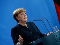 Меркель и Мэй осудили запрет на въезд мусульман в США