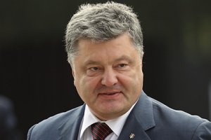 Порошенко в Берлине пообещал и дальше давить на Россию