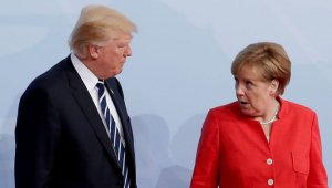 Трамп бросил Меркель на стол сосательные конфеты во время G7