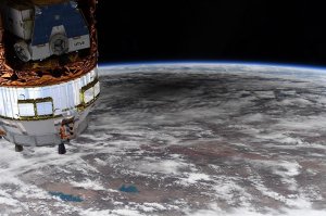 Американский астронавт сфотографировал с МКС тень от кольцевого затмения   (Зрелищное явление можно было наблюдать с земной поверхности 21 июня)