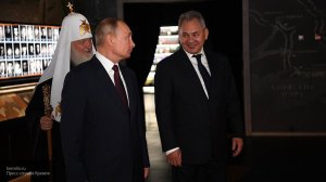Путин увидел фотоснимок своего отца в музейном комплексе "Дорога памяти"