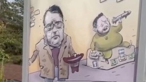 У посольства Швеции в Москве появилась карикатура с дипломатом-должником