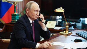 Путин поговорил по телефону с Макроном