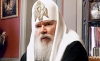 Алексий Второй призвал верующих дарить близким свет Рождества